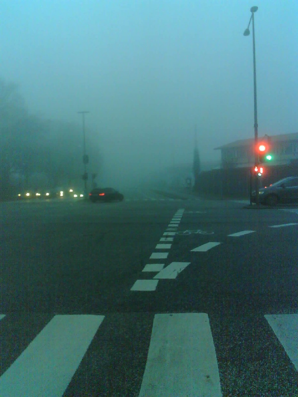 A street covered in fog.